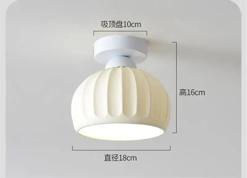 Cream-colored ribbed ceramic glass chandelier with white circular base for modern brass living room decorbites ceramic glass lighting
