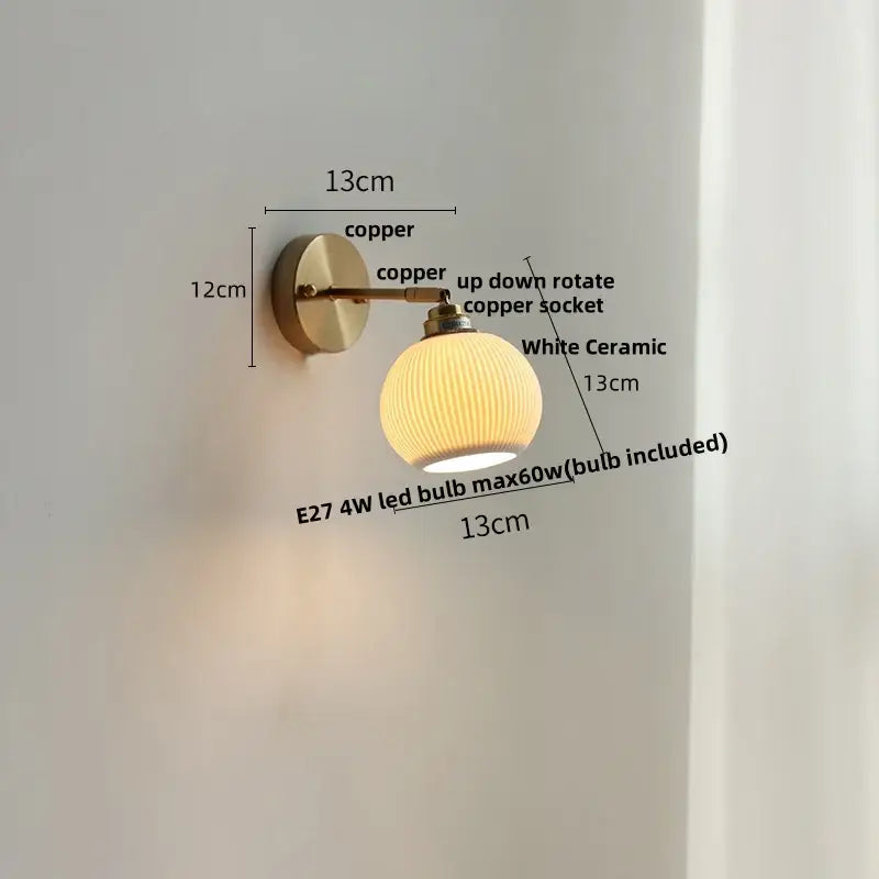 Modern ribbed white ceramic led wall light with copper-finished brass arm by decorbites for bedroom decor