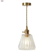 Modern ribbed clear glass led pendant light with brass fixture and twisted cord for kitchen decorbites clear glass design
