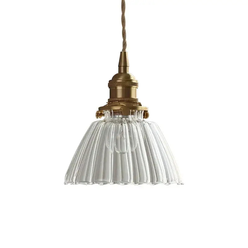 Modern ribbed clear glass pendant light with a brass fixture and twisted cord decorbites clear glass nordic style