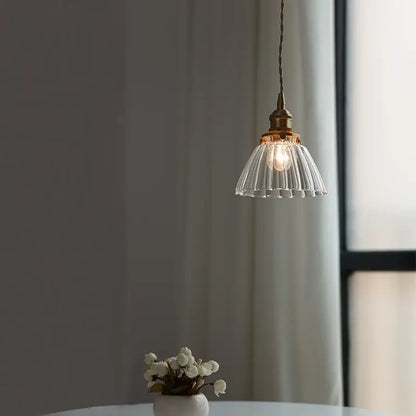 Modern ribbed clear glass pendant light with brass fixture and cord featuring decorbites clear glass nordic design