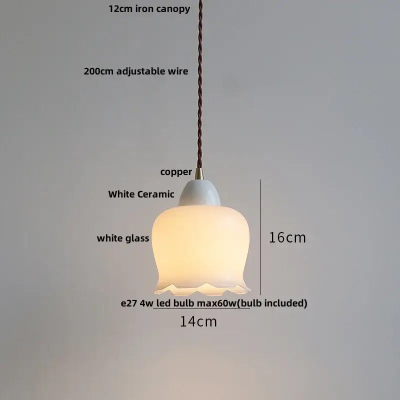 A delicate white ceramic and copper white glass pendant lamp with ribbed design and adjustable 200cm suspension wire