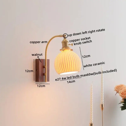 A warm-toned ribbed white ceramic wall light with copper arm and walnut mount for modern decorbites ceramic walnut led lighting