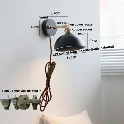 Black dome-shaped wall lamp with wooden base and copper accents for decorbites copper led wall lighting use
