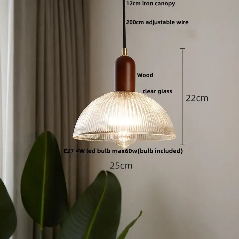 Modern ribbed glass led pendant light with warm-toned shade wood top cap and iron canopy for kitchen chandelier