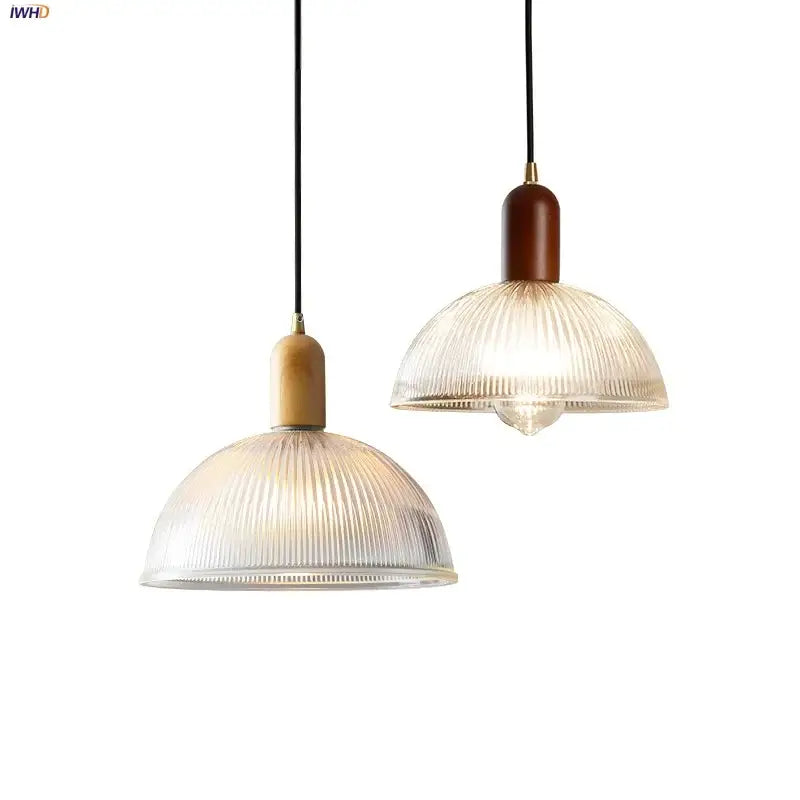 Two pendant lights with ribbed translucent glass led pendant shades and wood brass cylindrical fixtures for kitchen chandelier