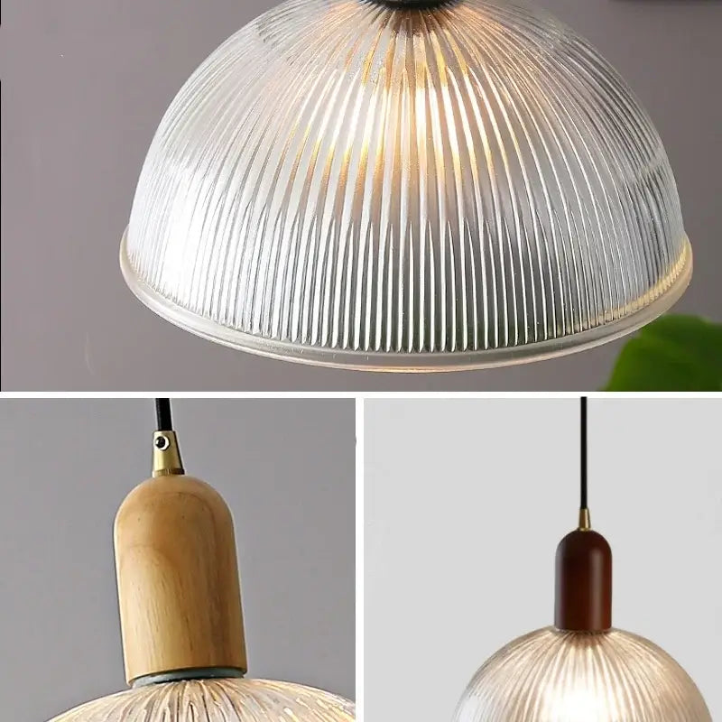 A warm-glowing modern ribbed glass led pendant light with wood and brass fixture for kitchen chandelier lighting