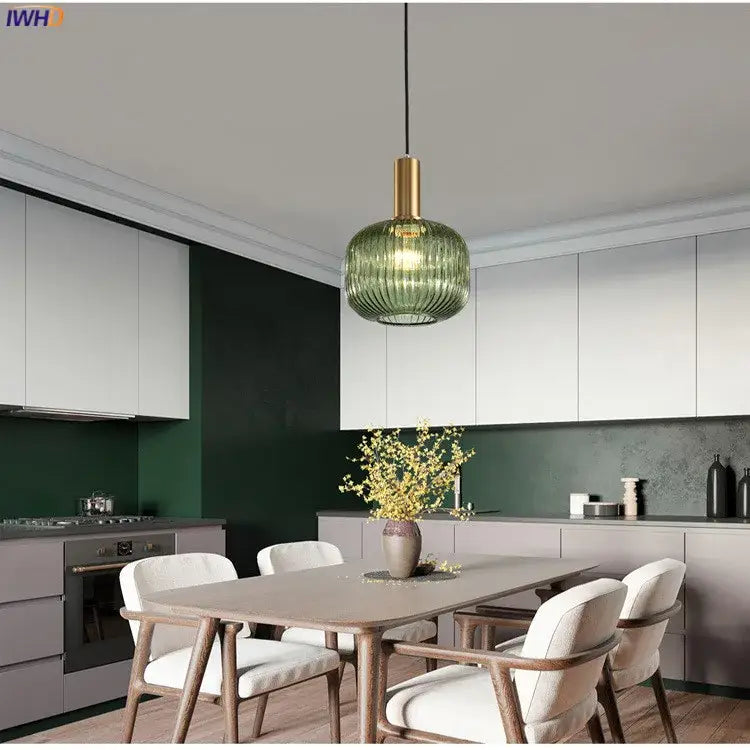 Modern green ribbed glass pendant light with brass-finished metal fixture ideal for dining room pendant lights