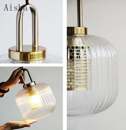 Aisha brand clear glass pendant lamp with ribbed glass shade and brass hardware for modern bedroom lighting decorbites clear glass