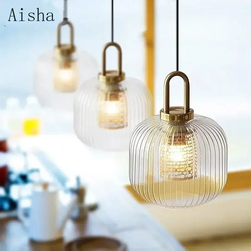 Modern ridged clear glass pendant lamp with vertical ridges and brass-colored metal fixture for decorbites clear glass lighting
