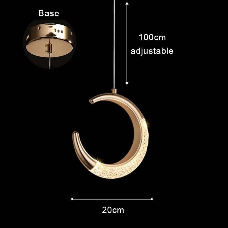 Gold crescent moon-shaped pendant light with sparkling crystal embellishments in modern rose gold acrylic led chandelier design