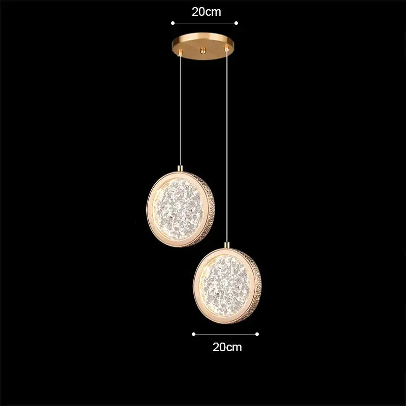 Modern rose gold acrylic led chandelier featuring gold-toned pendant light with crystal circular glass shades suspended by cords