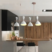 DecorBites modern funnel ceiling pendant with four white bell-shaped shades and rose gold metal for dining room lighting