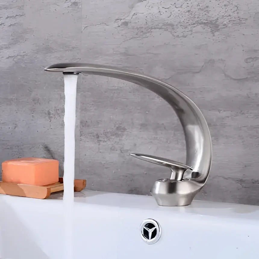 Modern rose gold and black brass decorbites basin faucet with sleek curved brushed stainless steel single handle design