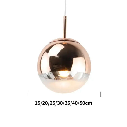 Modern rose gold pendant lights with a frosted glass ball pendant and mirrored finish for kitchen decorbites decor