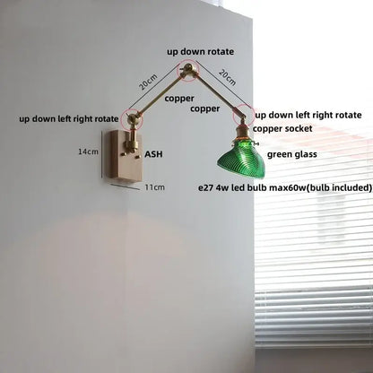 Adjustable copper wall light fixture with green glass shade and rotatable brass design for modern stair lighting