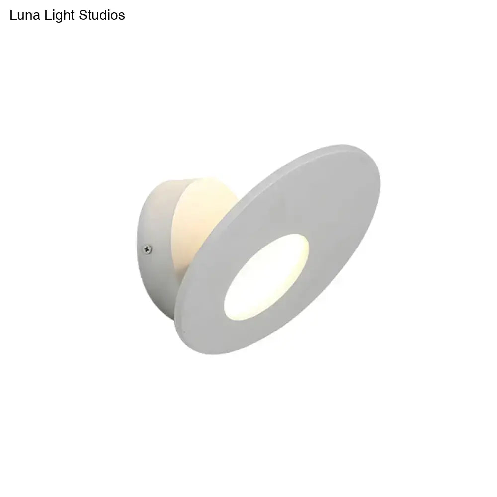 Modern round acrylic integrated led wall lamp in black and white with gray circular sconce and soft diffused lighting