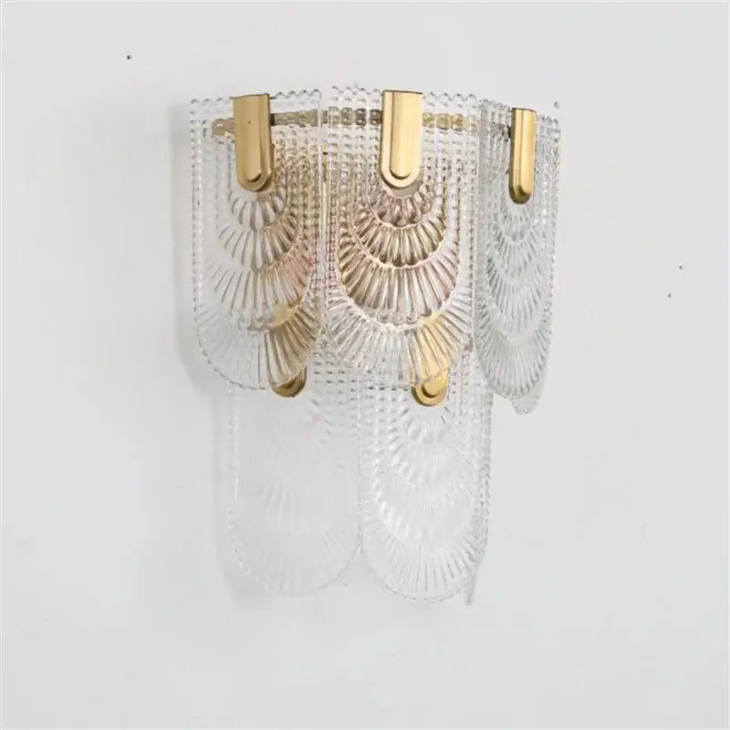 Modern scalloped art glass chandelier with clear glass sconce and gold-toned metal accents for dining room decorbites art glass