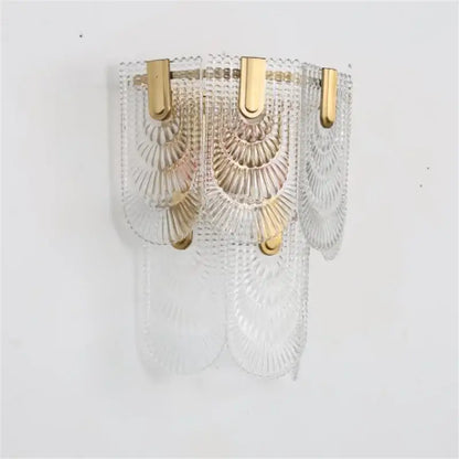 Modern scalloped art glass chandelier with clear glass sconce and gold-toned metal accents for dining room decorbites art glass