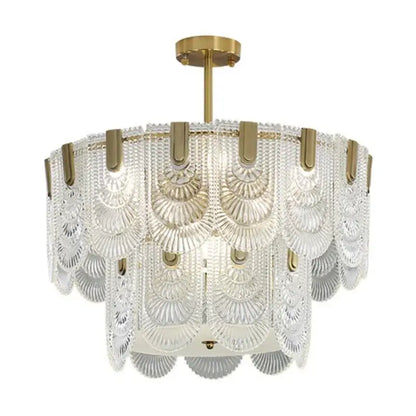Modern scalloped art glass chandelier with clear glass panels and gold metal accents for dining room decorbites art glass