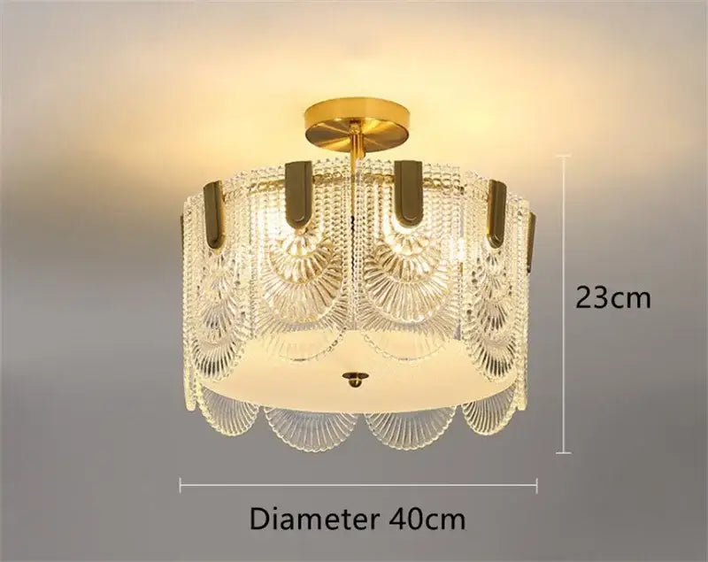 Modern scalloped gold glass chandelier with intricate fan-shaped art glass panels and frosted white diffuser for dining room decorbites art glass chandelier