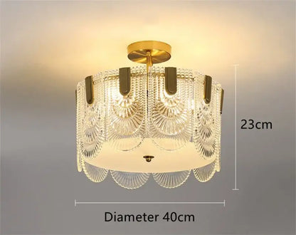 Modern scalloped gold glass chandelier with intricate fan-shaped art glass panels and frosted white diffuser for dining room decorbites art glass chandelier