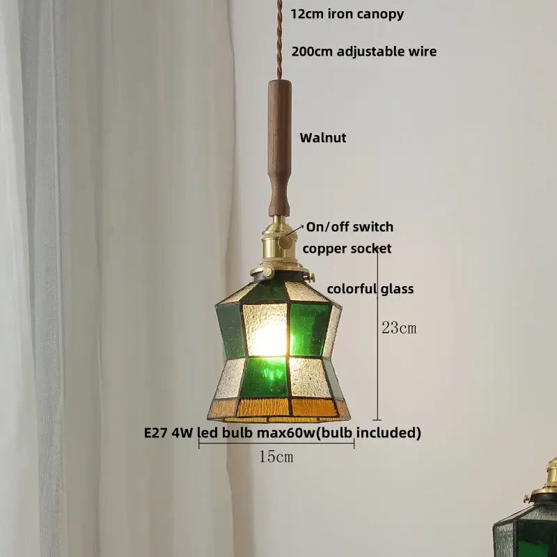 Modern scalloped floral ceramic led pendant light with a geometric stained glass shade in green amber and clear hues