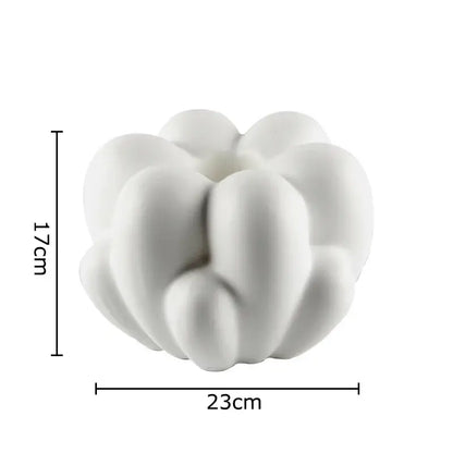 White ceramic creative petal vase with modern rounded interconnected lobes for living room decor
