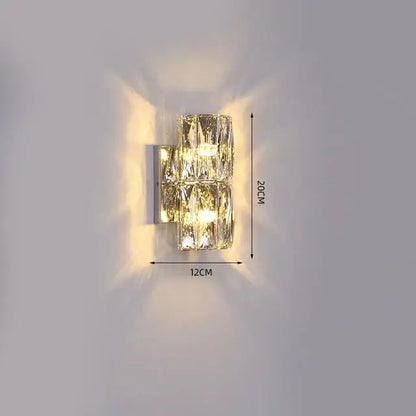 Modern segmented crystal wall lamp with faceted glass and sleek metallic base for living room decorbites crystal wall lamp