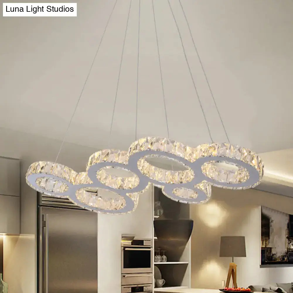 DecorBites™ modern bubble led pendant with stainless steel frame and clear crystal rings designed for island lighting