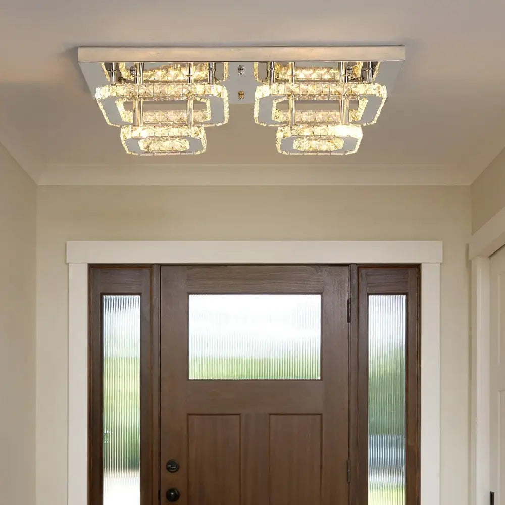 Modern silver crystal ceiling chandelier with two stacked illuminated crystal panels and polished chrome accents
