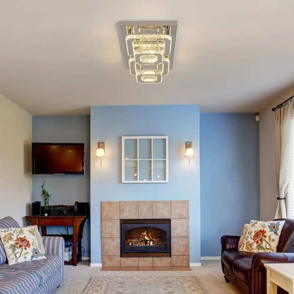 Modern silver crystal ceiling chandelier with layered crystal elements and sleek metallic frame for living room lighting