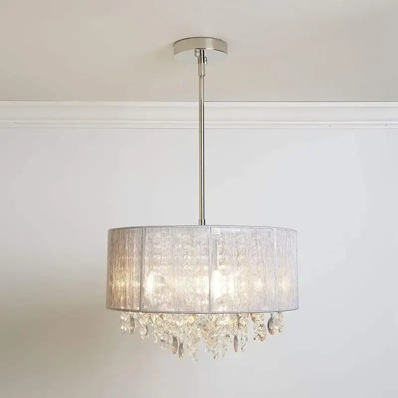Modern silver crystal fabric pendant lamp with sheer drum shade and crystal droplets for bedroom decorbites pendant lamp