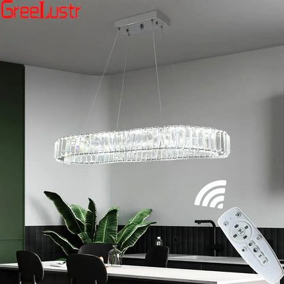 Modern silver led chandelier featuring a sleek oval crystal oval design with a silver-toned metal frame for living room decor