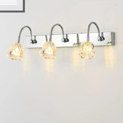Modern silver crystal petal bathroom wall vanity light with three adjustable chrome gooseneck arm flower-shaped shades