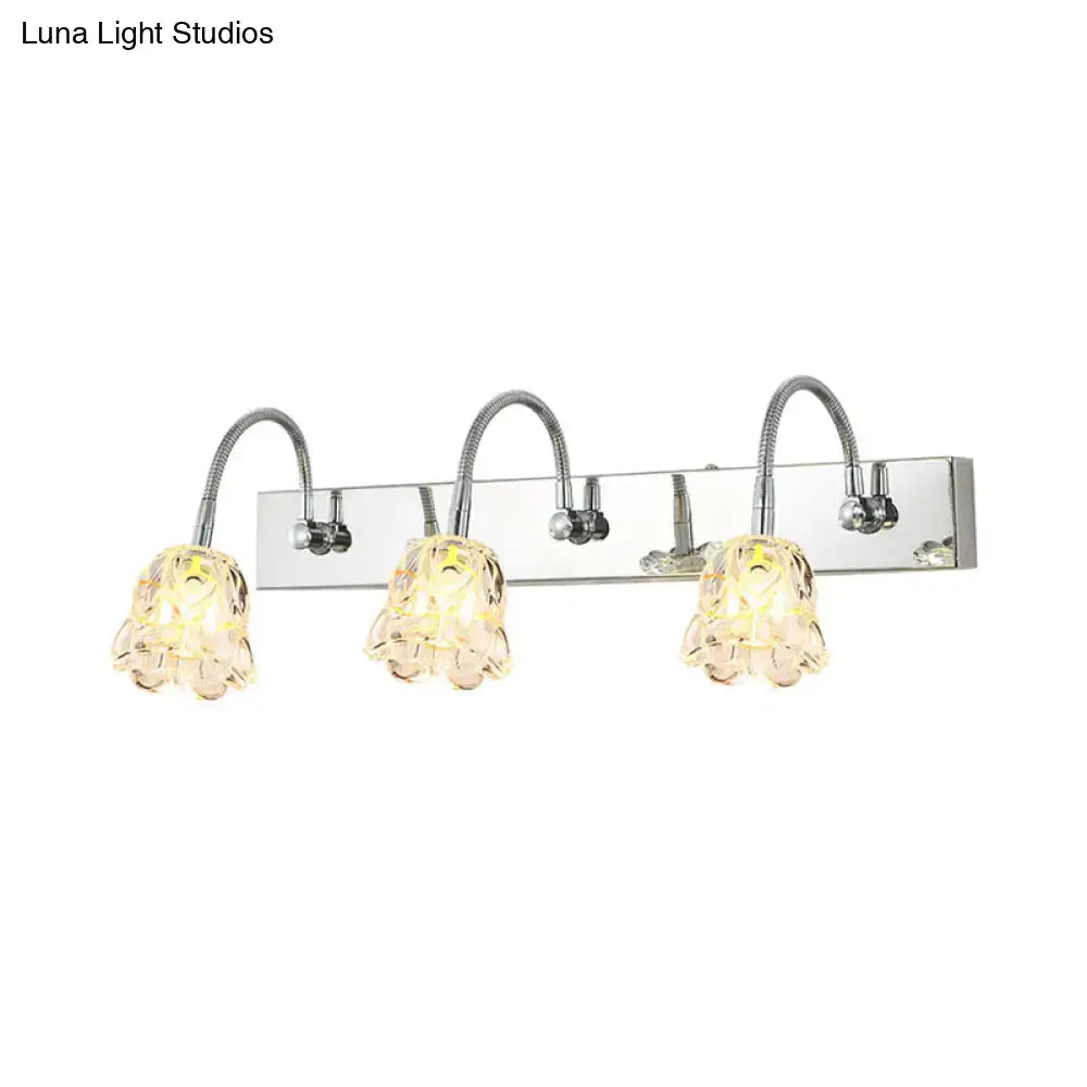 Chrome finished modern silver crystal petal vanity light with three flexible gooseneck arm clear glass shades