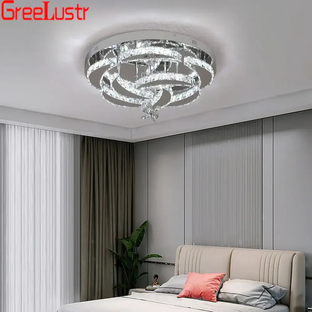 Modern silver crystal raindrop led chandelier ceiling light with concentric rings and chrome metal decorbites crystal raindrop