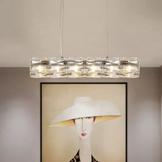 Modern silver crystal tube island light with a sleek metal frame and multiple embedded lights for dining rooms