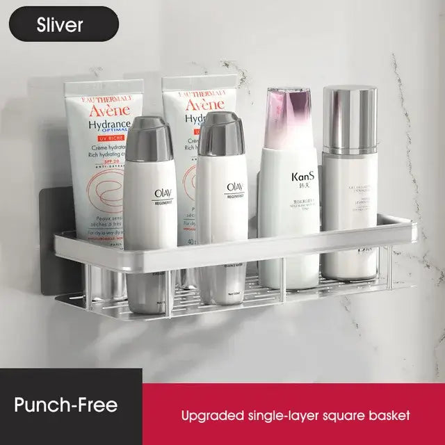 Modern silver metallic double tiered decorbites corner shower shelf holding multiple skincare products for bathroom storage