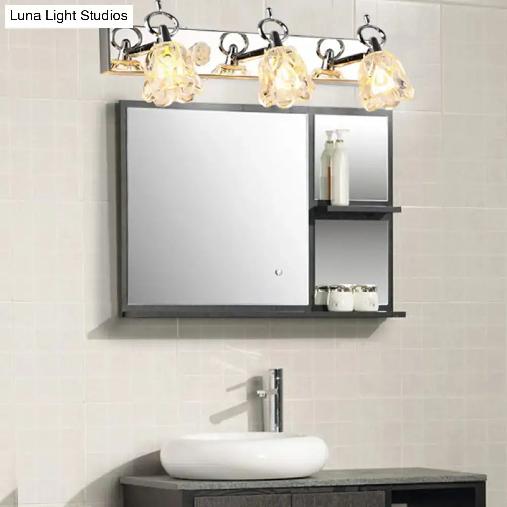 Modern silver finish wall light with clear glass crystal shades designed for bathroom vanity use