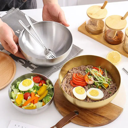 Shiny silver and gold stainless steel mixing bowls with sleek modern design and matching decorbites stainless steel utensils