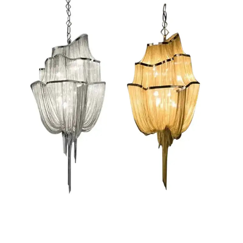 Modern silver tassel chain chandelier featuring elegant layered shell-shaped glass shades in clear and amber hues for dining decorbites gold tassel style