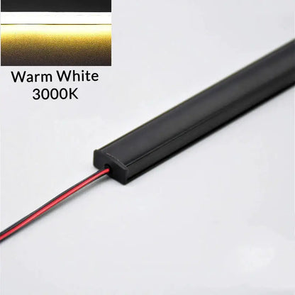 Black rectangular led bar strip light with warm white 3000k illumination for modern silver u-shape kitchen under cabinet use
