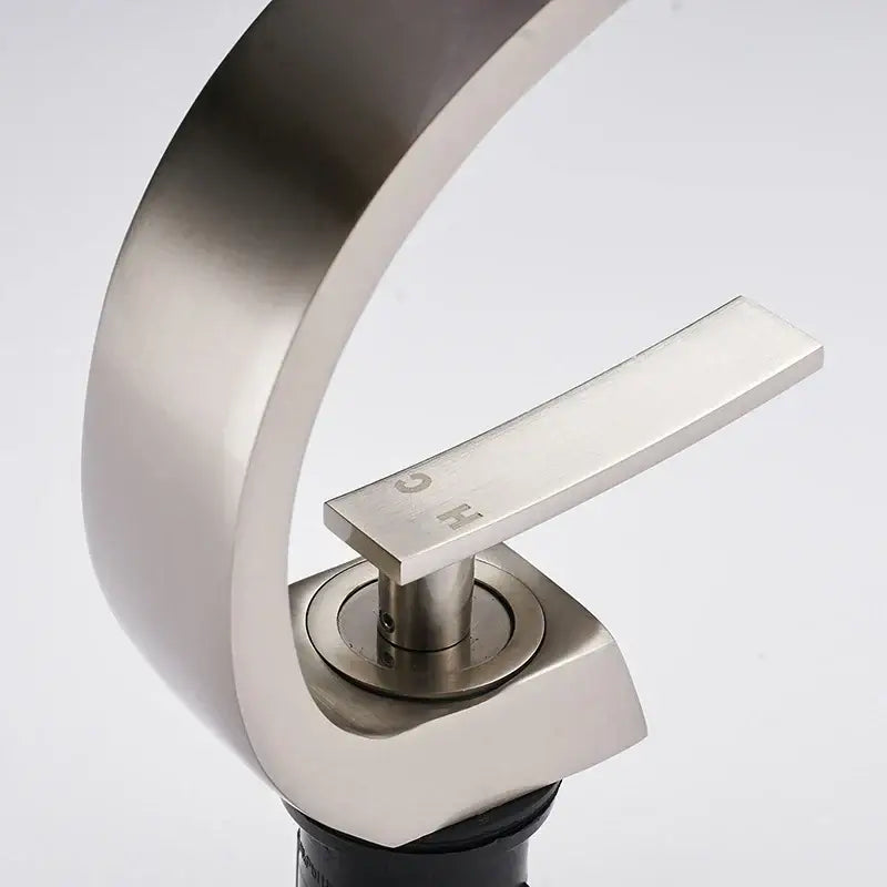 Modern silver waterfall decorbites basin faucet with brushed nickel finish sleek curved spout and rectangular handle