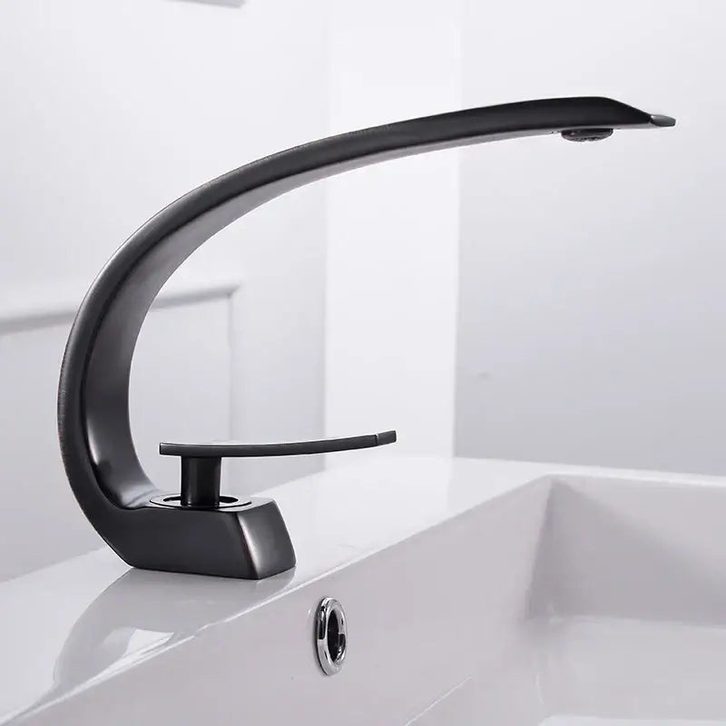 Modern silver waterfall decorbites basin faucet with black matte finish and sleek curved design for bathroom use