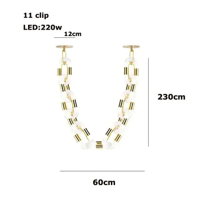 Modern silver and white crystal gold chain chandelier with translucent oval beads and gold chain chandelier accents