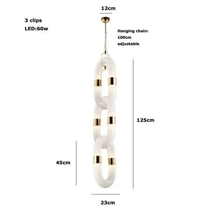 Modern silver and white crystal gold chain chandelier featuring a sleek acrylic chain with gold chain chandelier accents