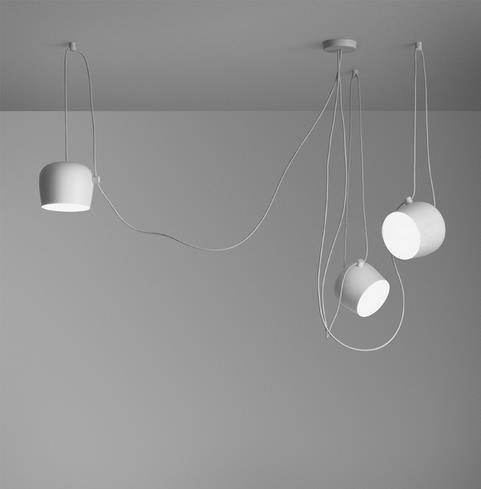 White cylindrical modern simple aluminum snare chandelier pendant light with integrated cord and minimalist design