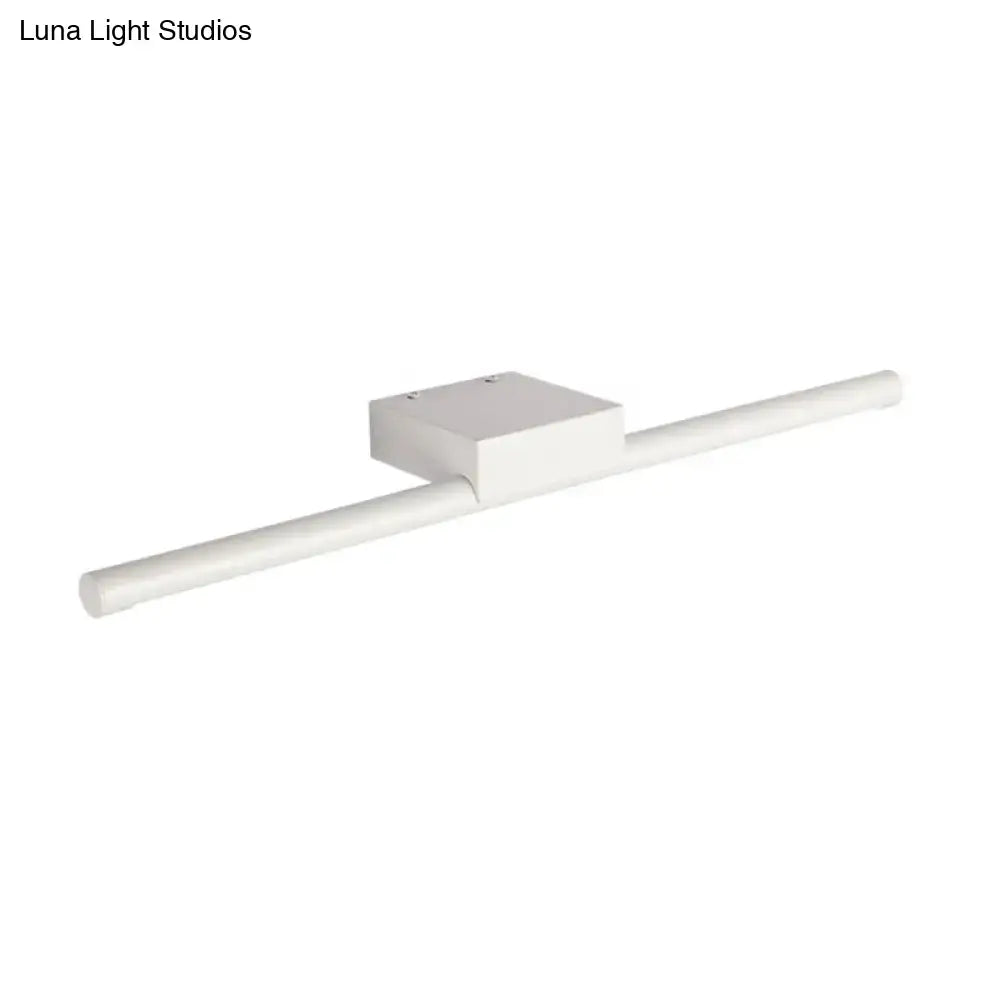 Modern slim white led light fixture with a cylindrical bar providing warm light for bathroom walls