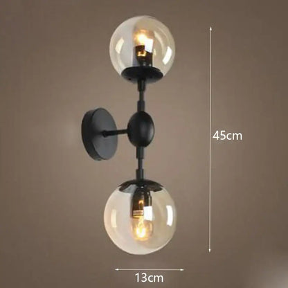 Black metal glass beans wall sconce with two clear smoked glass globe shades modern decorbites beans wall lamp